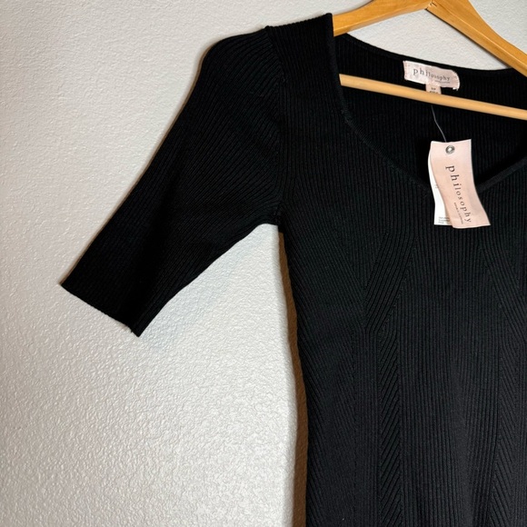 New Philosophy Small Black
Top - Picture 7 of 9